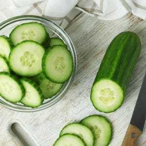 Concept of ripe vegetable with cucumbers, top view