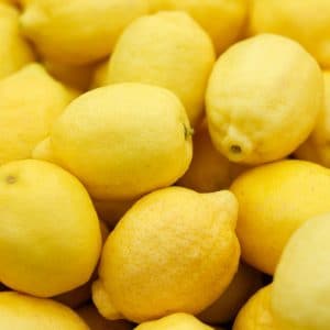 Ripe yellow lemons background